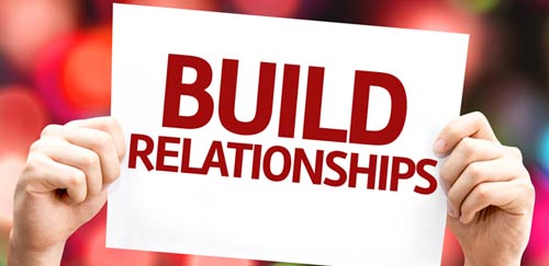 build relationships sign